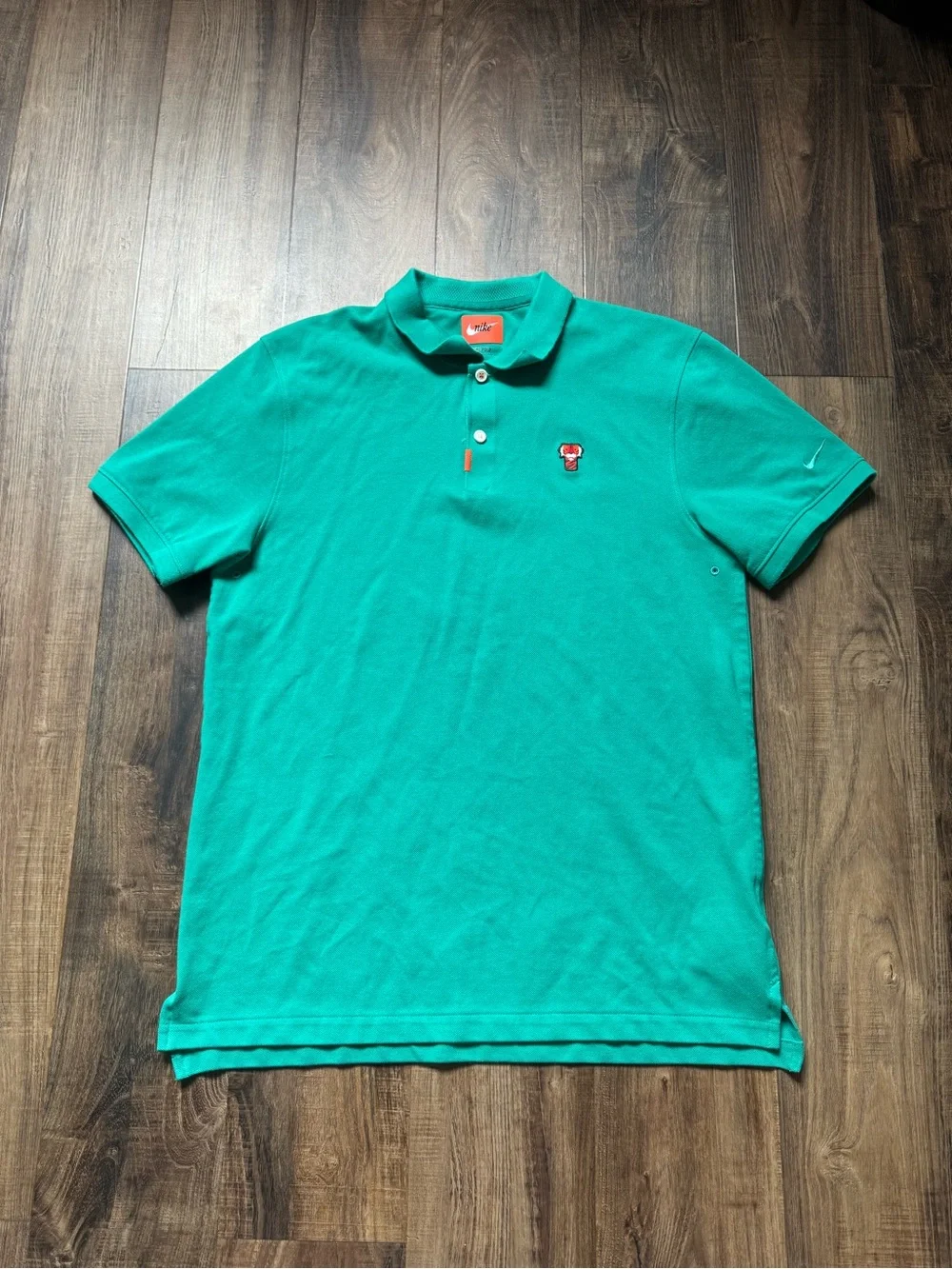 Nike Men's Green Polo Shirt with Tiger Logo
